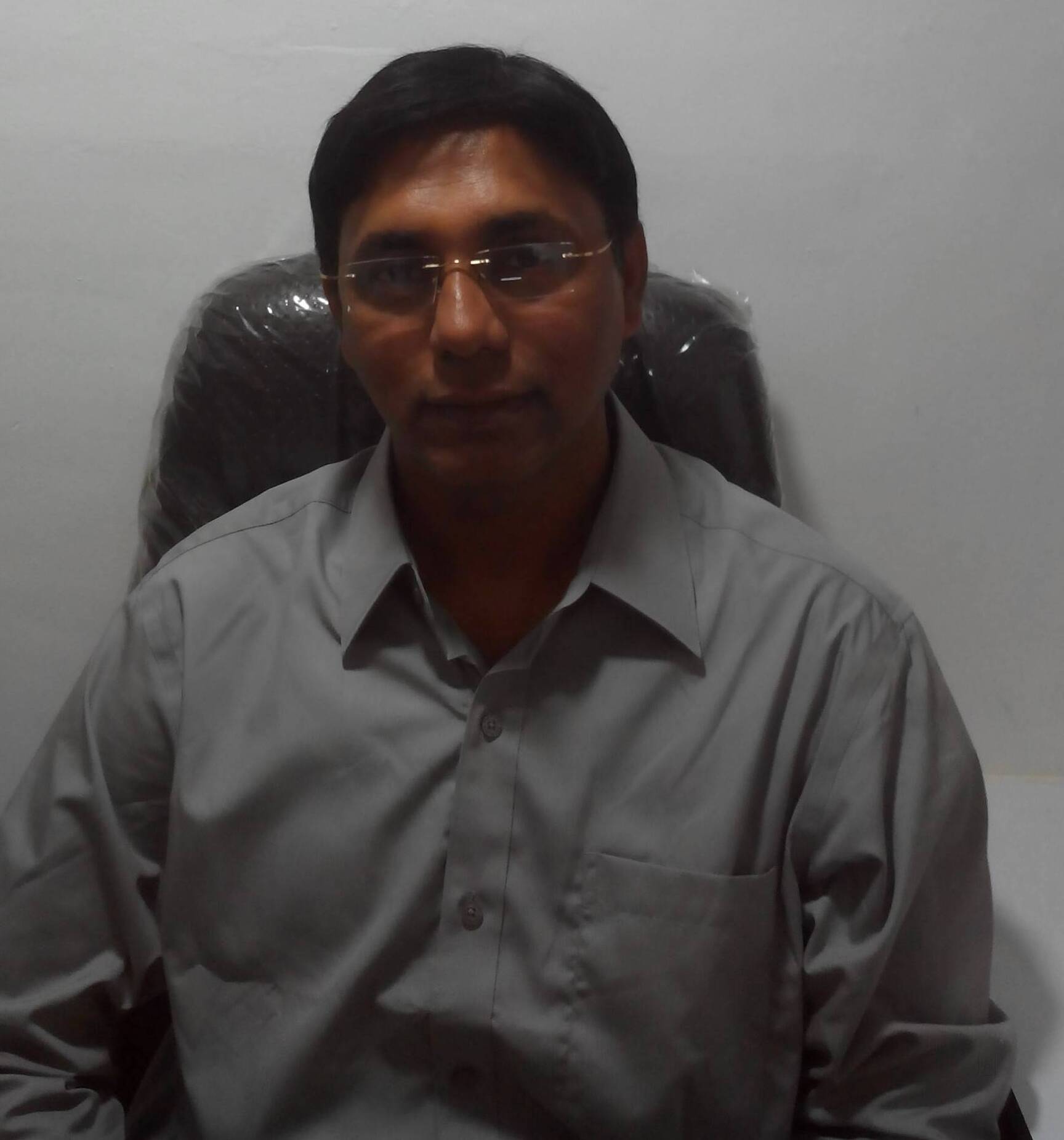 Dr Malhar Gholap
